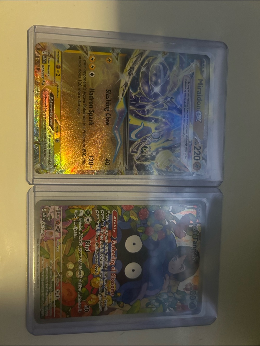 Pokemon Gold & Blue Holo Trading Cards - Miralido EX and Floral V